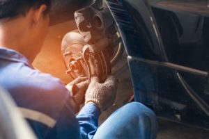 Mechanic Working on Brake Repair | Strongsville, OH